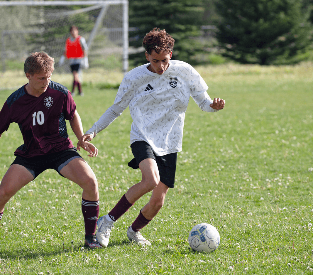 high school boy playing soccer